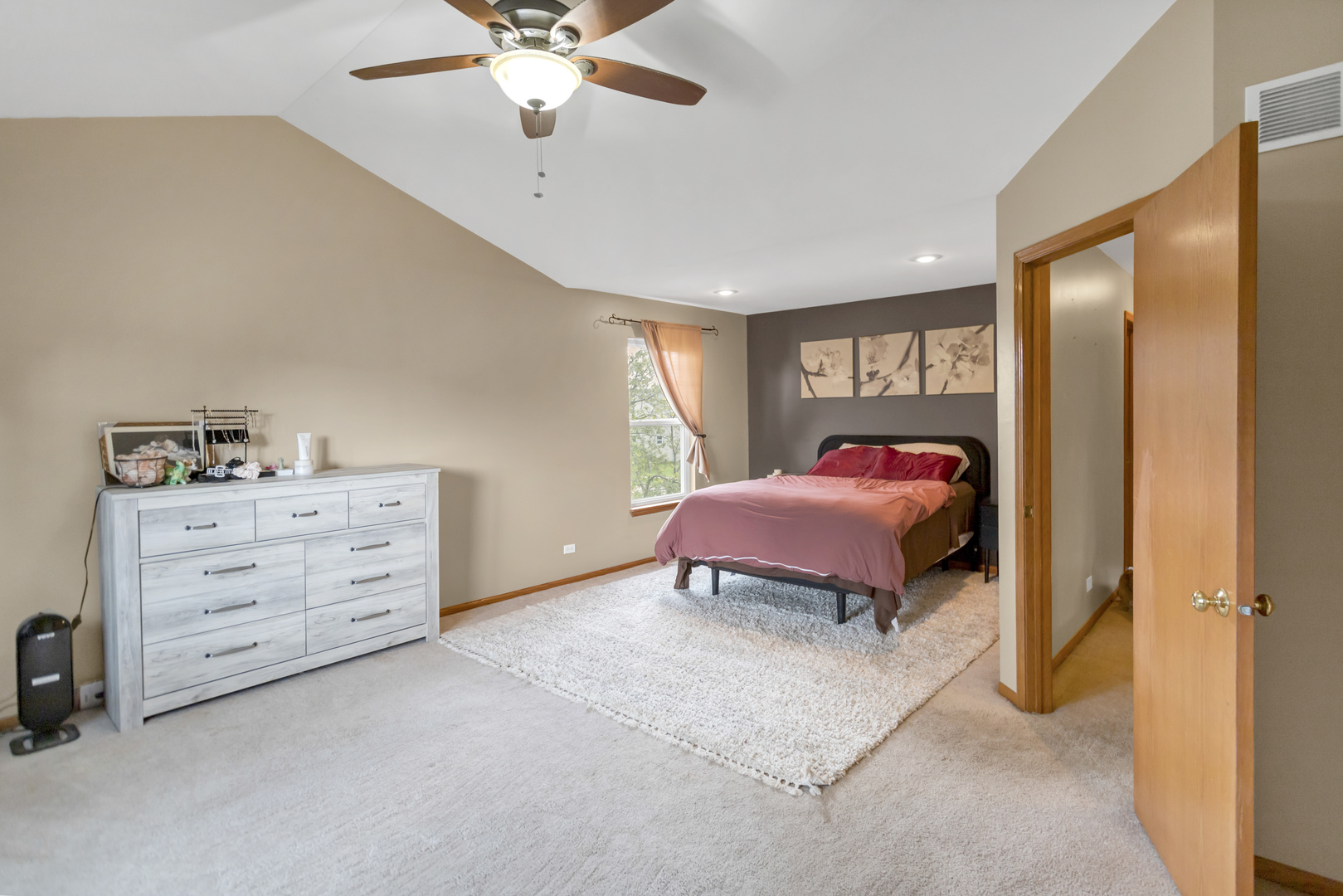 2112 Wicklow Lane Round Lake, IL 60073 - Photo 20 of 34 a bedroom with a bed and closet