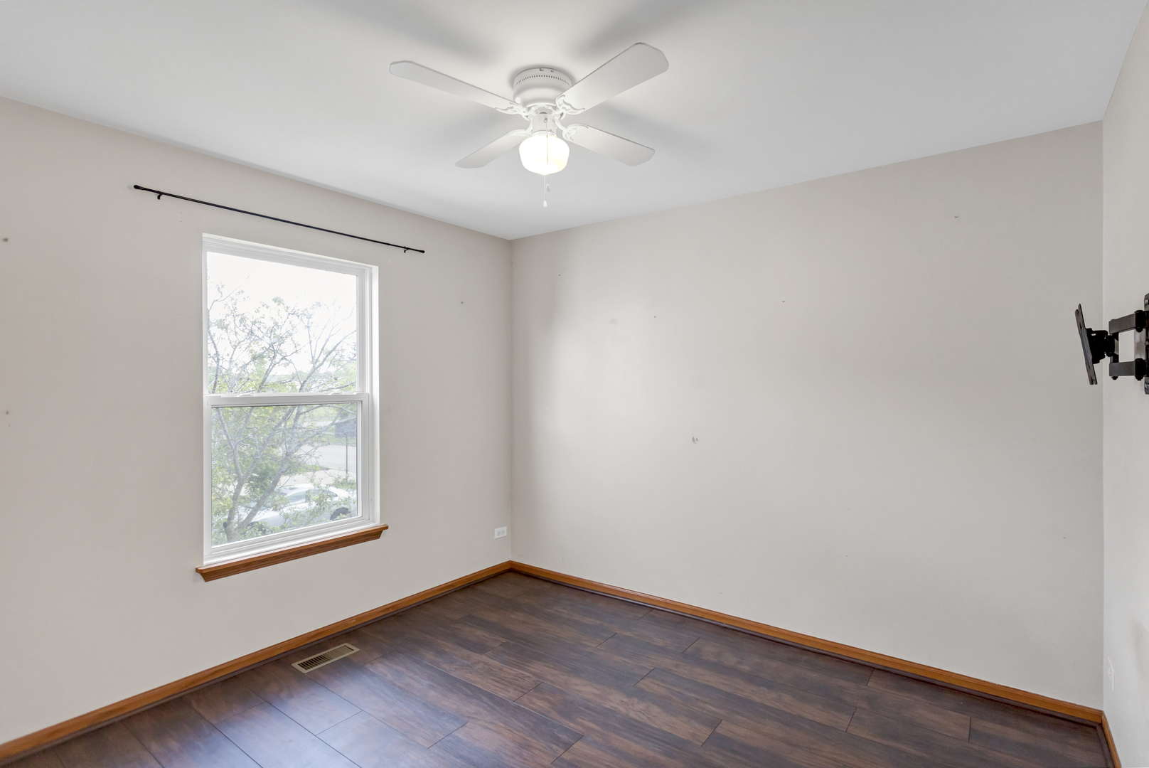 2112 Wicklow Lane Round Lake, IL 60073 - Photo 23 of 34 an empty room with wooden floor and windows