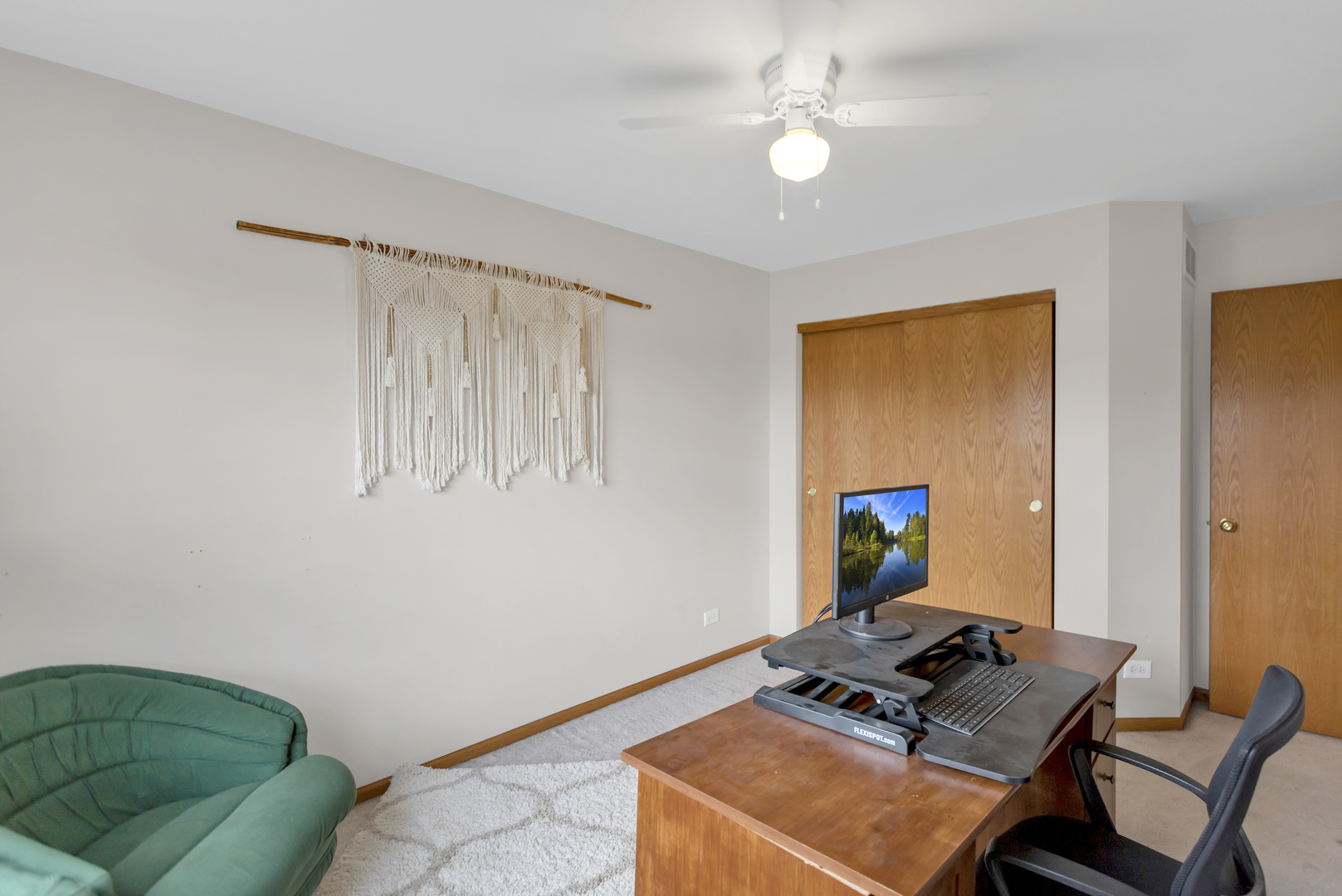 2112 Wicklow Lane Round Lake, IL 60073 - Photo 30 of 34 a room with furniture and a window