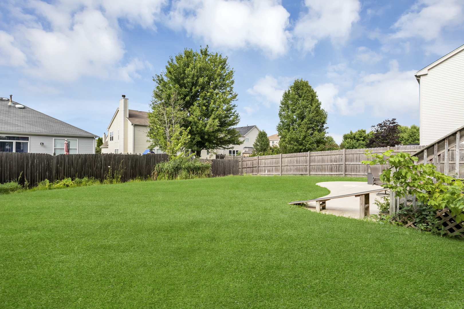 2112 Wicklow Lane Round Lake, IL 60073 - Photo 5 of 34 a view of a backyard with green space