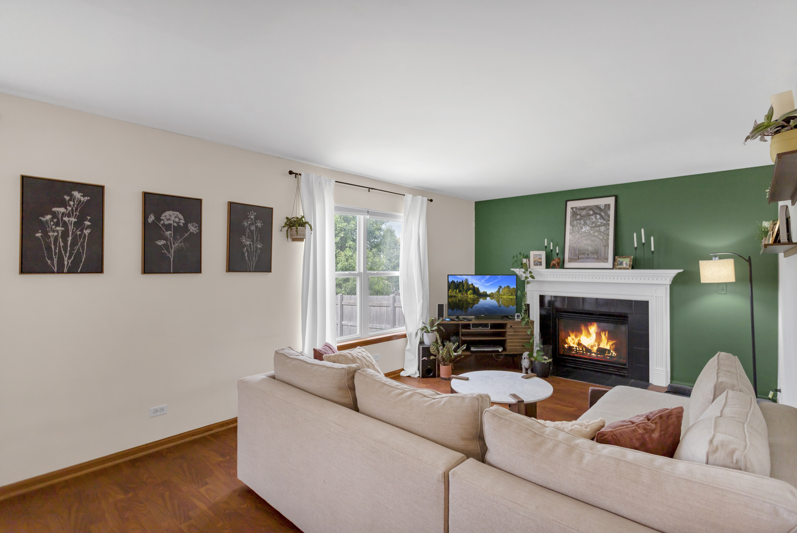 2112 Wicklow Lane Round Lake, IL 60073 - Photo 7 of 34 a living room with furniture and a fireplace