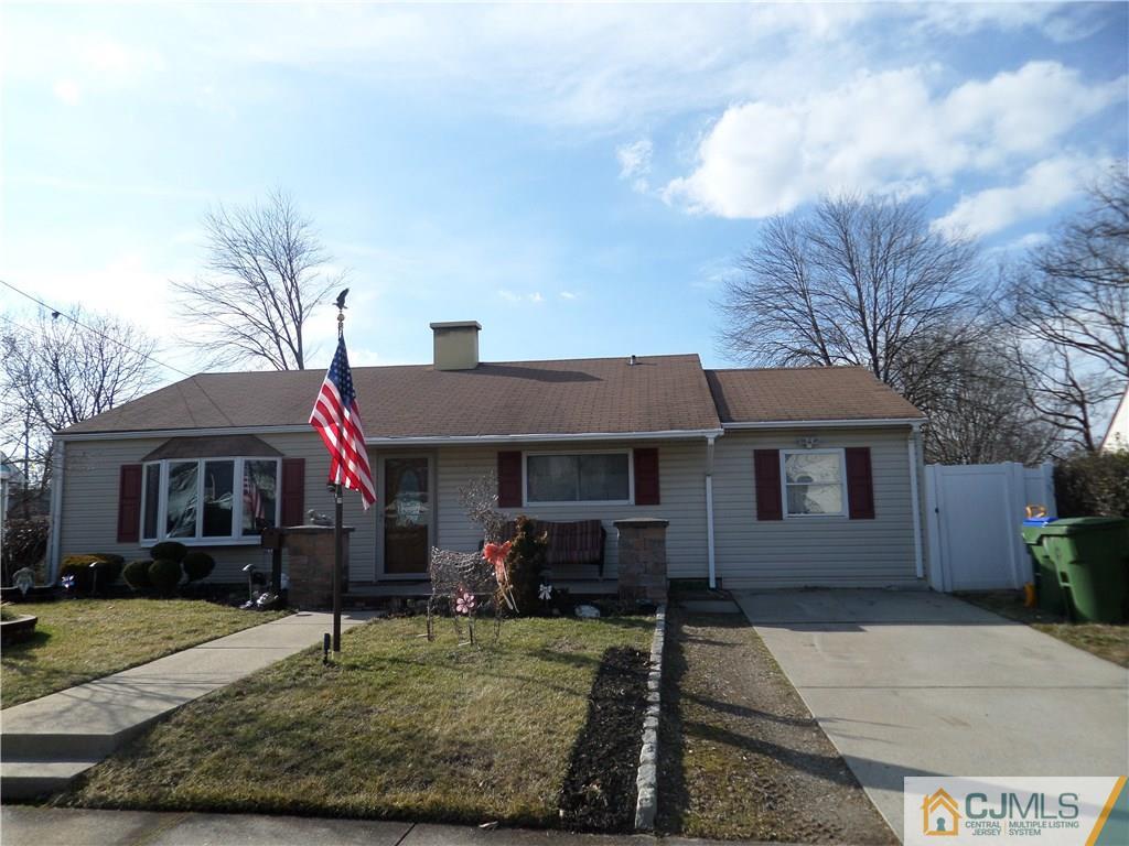 6 Baxter Road Edison, NJ 08817 - Photo 1 of 19 a front view of a house with garden