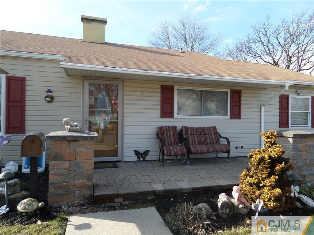 6 Baxter Road Edison, NJ 08817 - Photo 4 of 19 a front view of house with outdoor seating