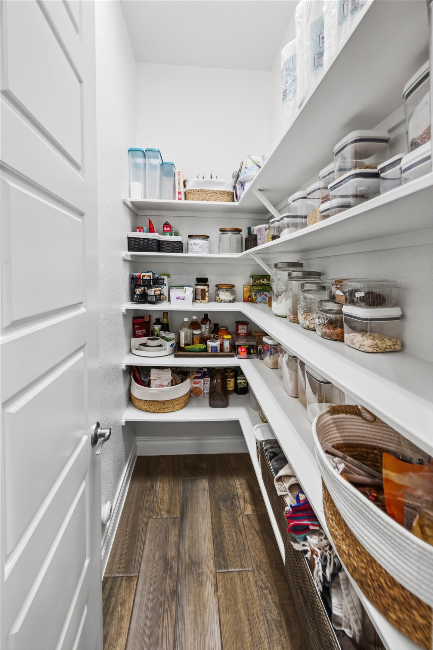 140 Catani Loop Georgetown, TX 78628 - Photo 23 of 36 A well-organized pantry offers abundant storage with built-in shelving.