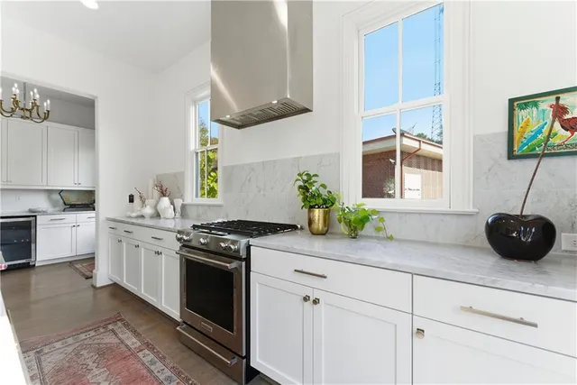 a kitchen with a cabinets and window