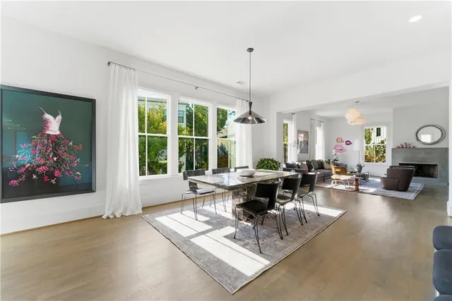 a bedroom with a bed a table and chair