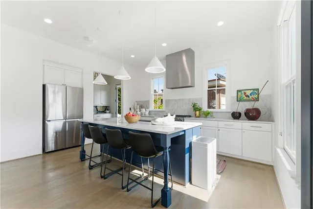 a view of a dining room with furniture and window