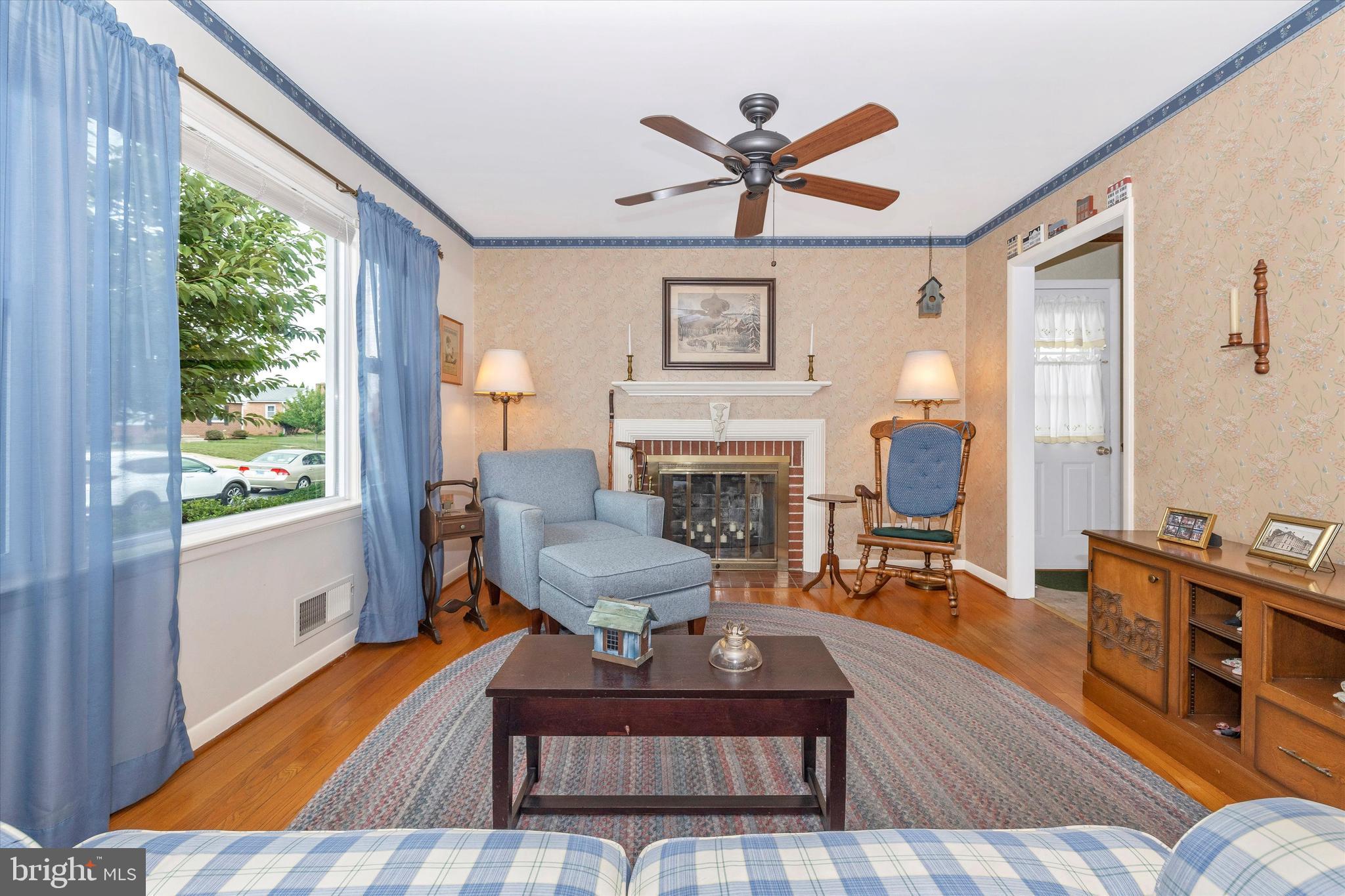 910 Seminole Road Frederick, MD 21701 - Photo 4 of 31 Living Room with Wood Burning Fireplace