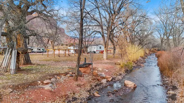 a backyard of a house with lots of green space