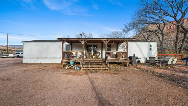 a view of a car park in front of house