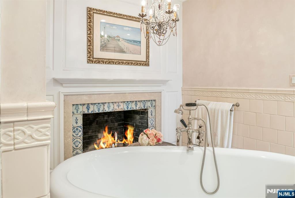 74 Village Road New Vernon, NJ 07976 - Photo 26 of 50 a white building with a fireplace