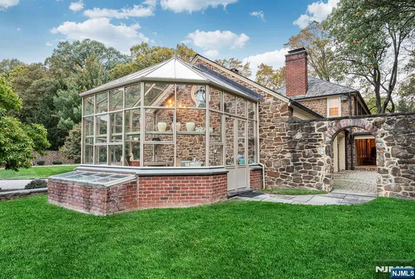a view of a house with a yard balcony