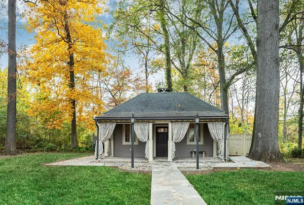 a view of a porch with wooden floor