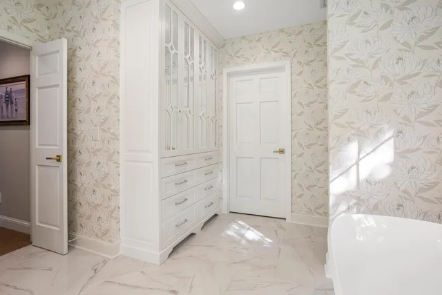 a view of a glass door and a window