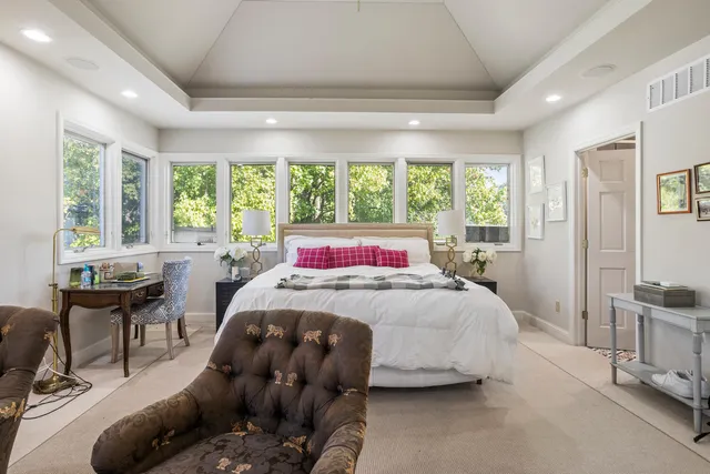 a bedroom with a bed and furniture