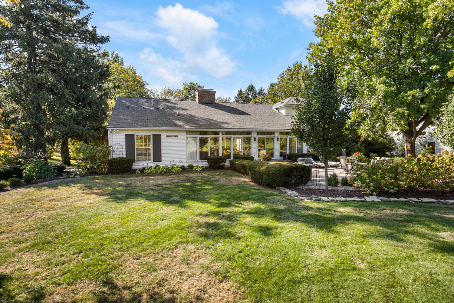 7 Greencroft Drive Champaign, IL 61821 - Photo 37 of 45 a view of a house with swimming pool and sitting area