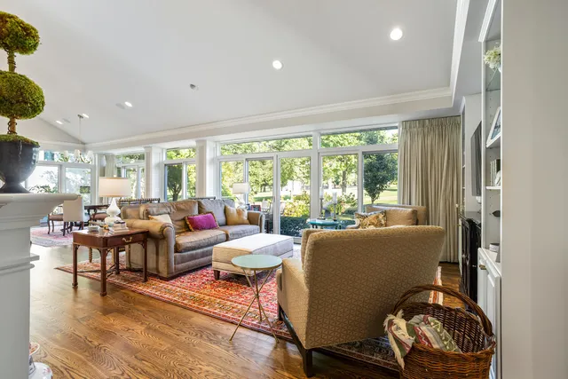 a room with furniture and wooden floor