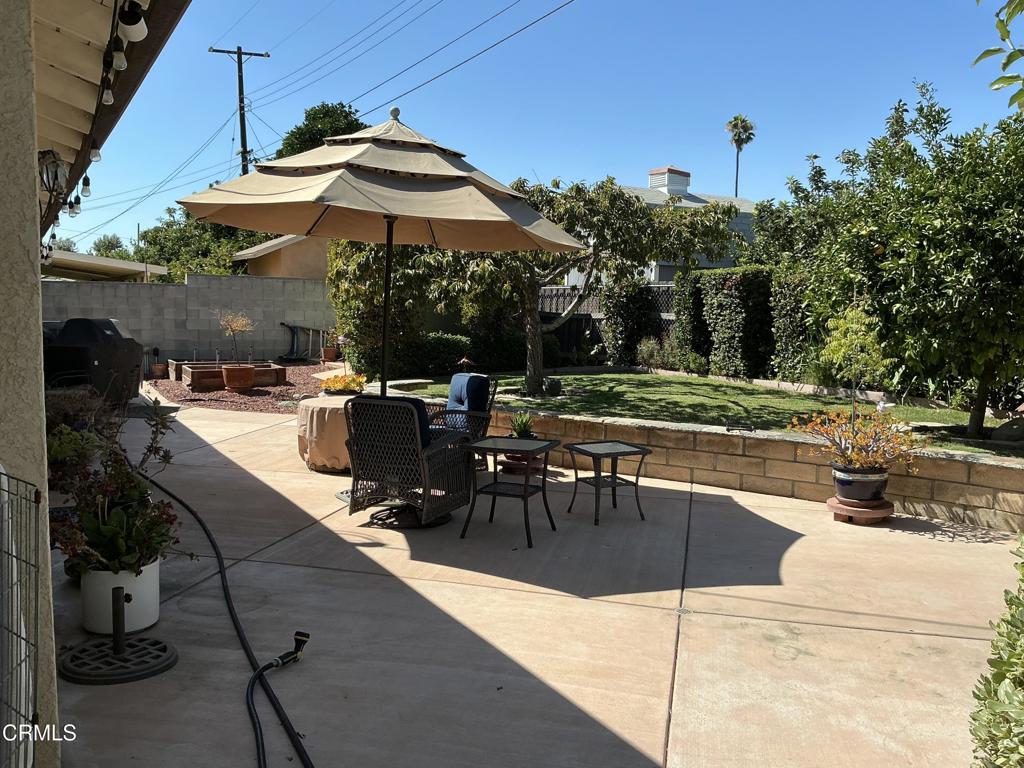 285 2nd Street Moorpark, CA 93021 - Photo 34 of 35 a view of a patio with a table and chairs under an umbrella