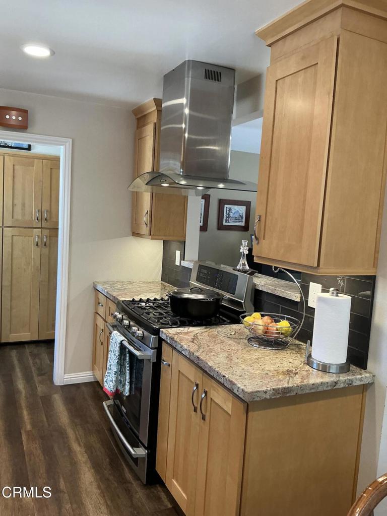 285 2nd Street Moorpark, CA 93021 - Photo 7 of 35 a kitchen with a stove and a refrigerator