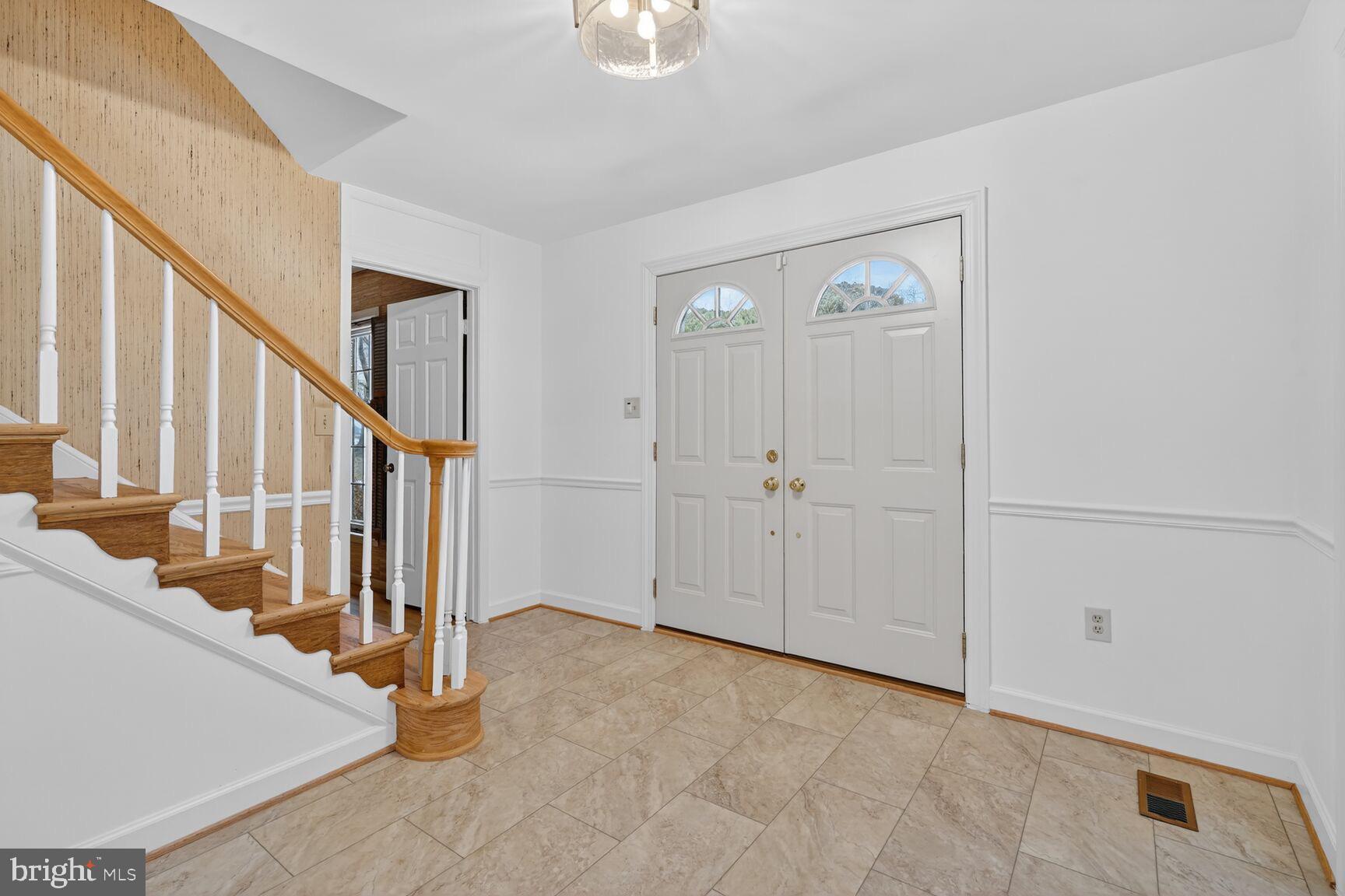 15200 Winstead Lane Silver Spring, MD 20905 - Photo 11 of 53 a view of an entryway with staircase