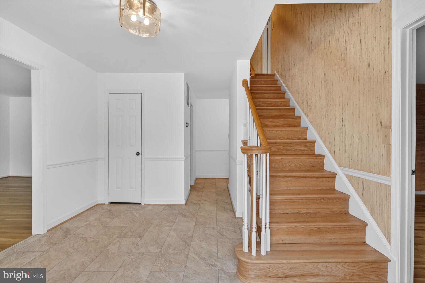 15200 Winstead Lane Silver Spring, MD 20905 - Photo 12 of 53 a view of entryway and hall with wooden floor