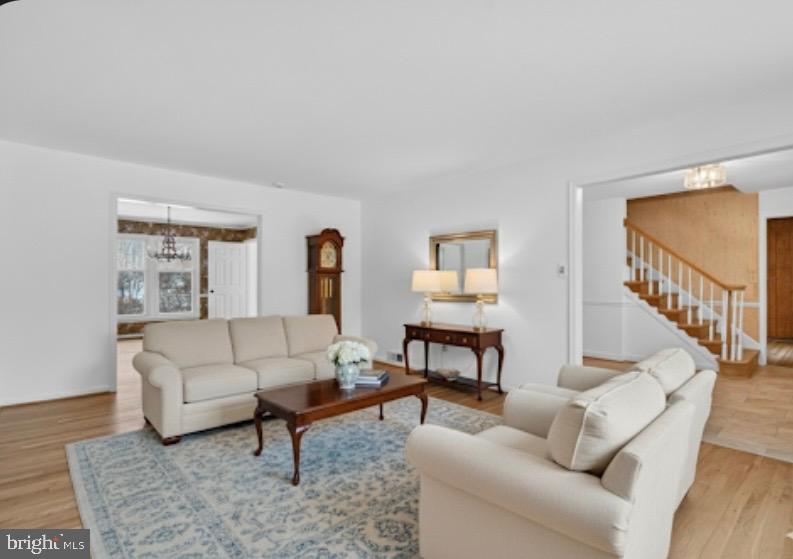 15200 Winstead Lane Silver Spring, MD 20905 - Photo 15 of 53 a living room with furniture or couch and a wooden floor