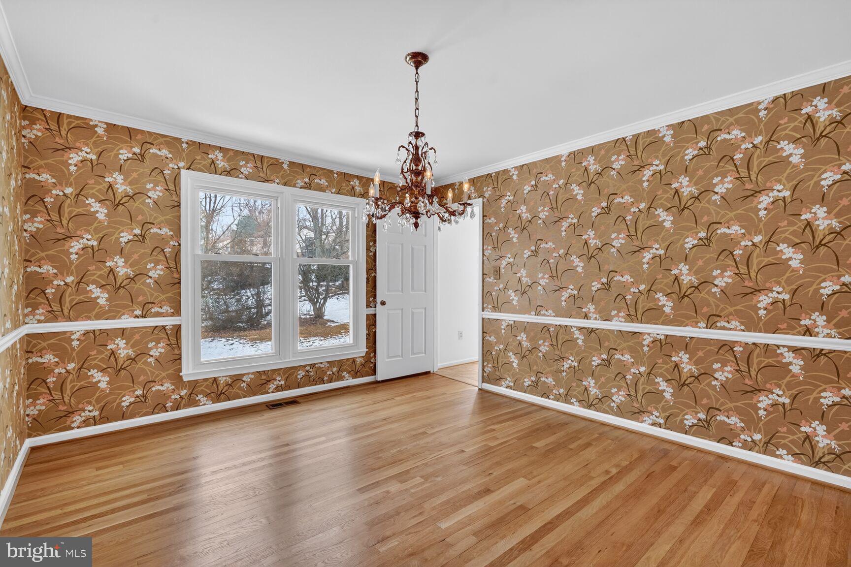 15200 Winstead Lane Silver Spring, MD 20905 - Photo 17 of 53 a view of a room with wooden floor fan and windows