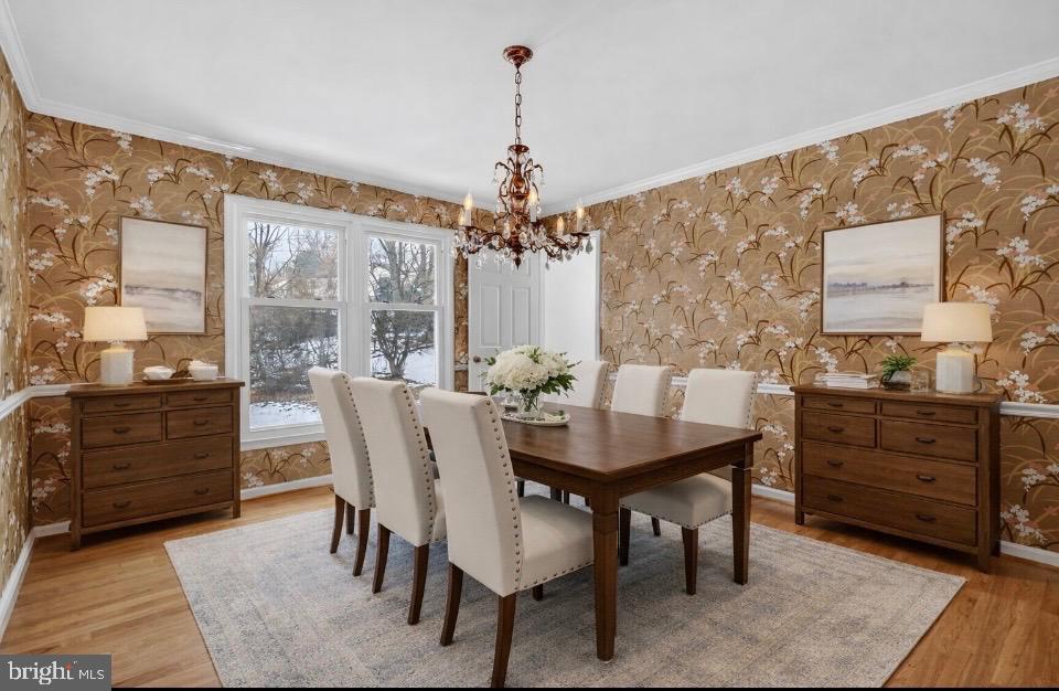 15200 Winstead Lane Silver Spring, MD 20905 - Photo 18 of 53 a view of a dining room with furniture window and wooden floor