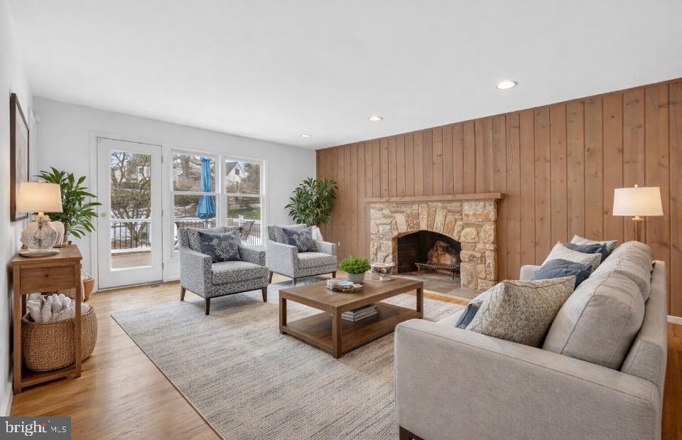 15200 Winstead Lane Silver Spring, MD 20905 - Photo 27 of 53 a living room with furniture and a fireplace