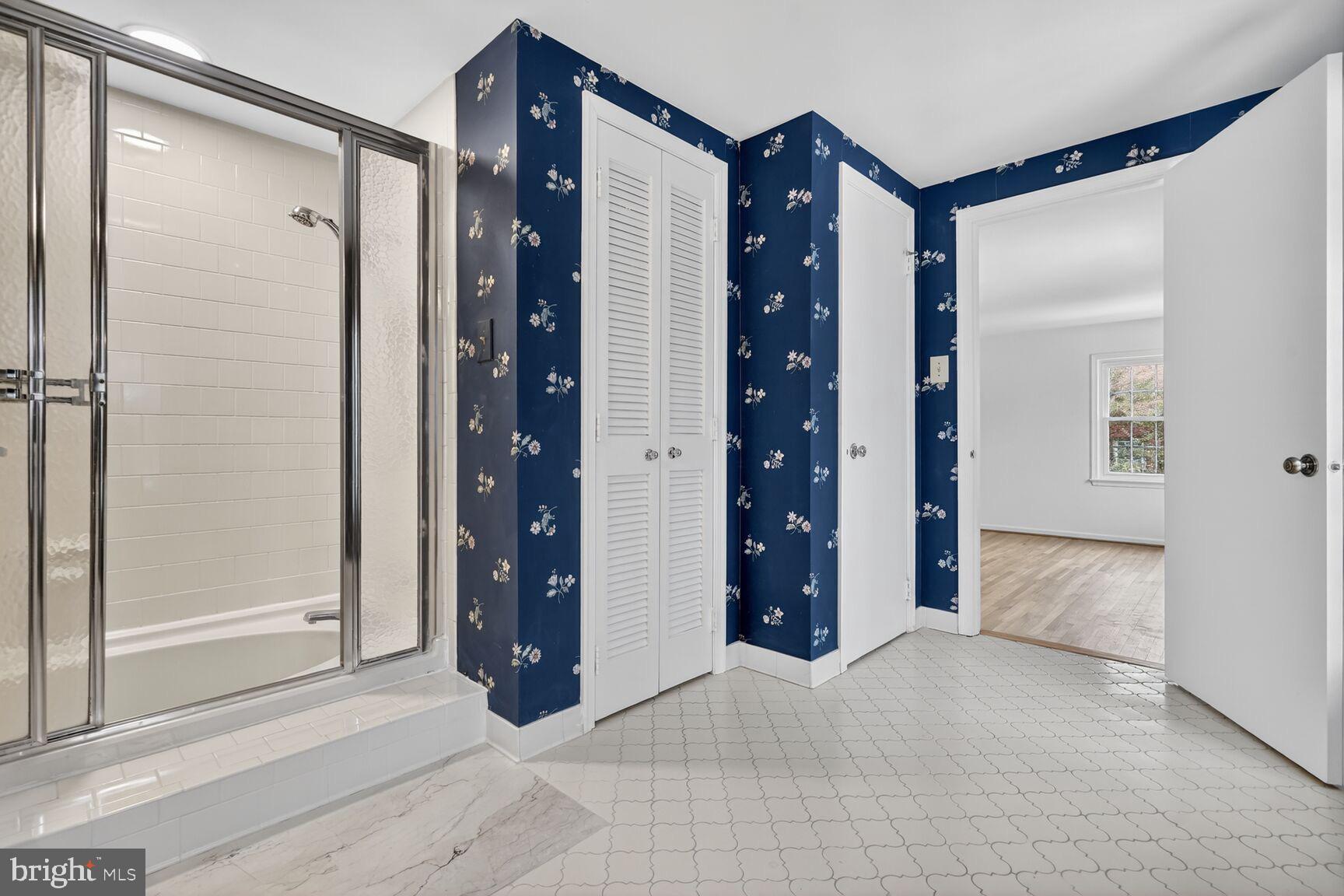 15200 Winstead Lane Silver Spring, MD 20905 - Photo 36 of 53 Charming bathroom with vibrant wallpaper accents.
