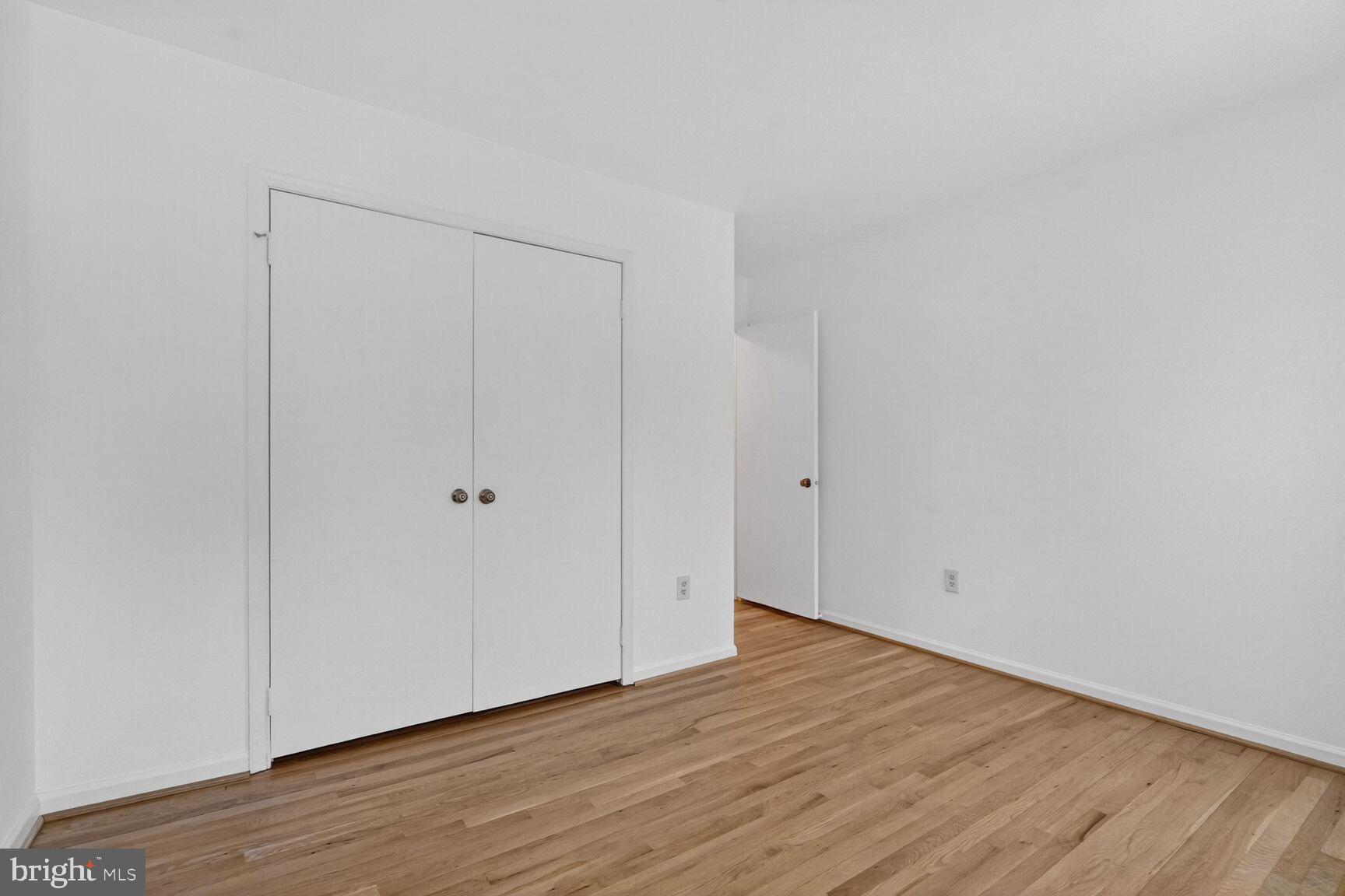 15200 Winstead Lane Silver Spring, MD 20905 - Photo 41 of 53 a view of an empty room with wooden floor
