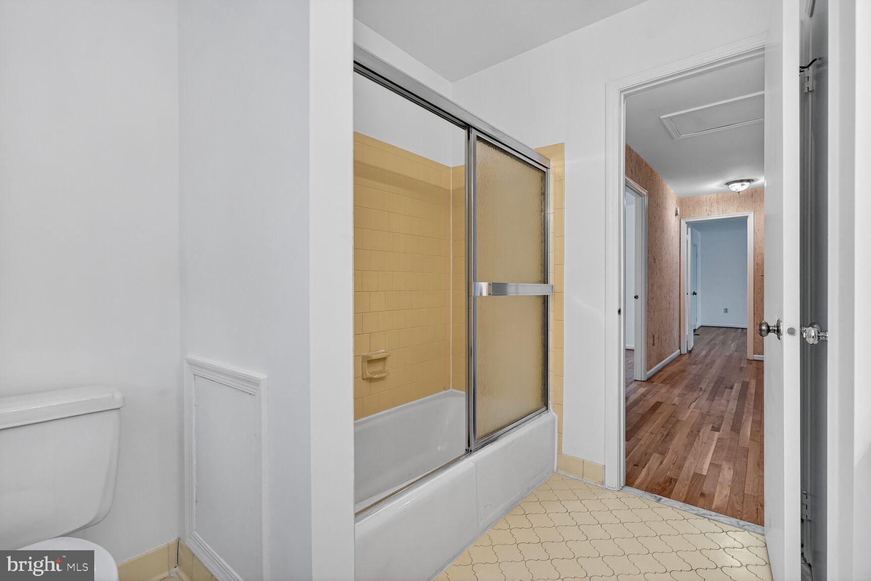 15200 Winstead Lane Silver Spring, MD 20905 - Photo 44 of 53 a bathroom with a granite countertop sink and a mirror