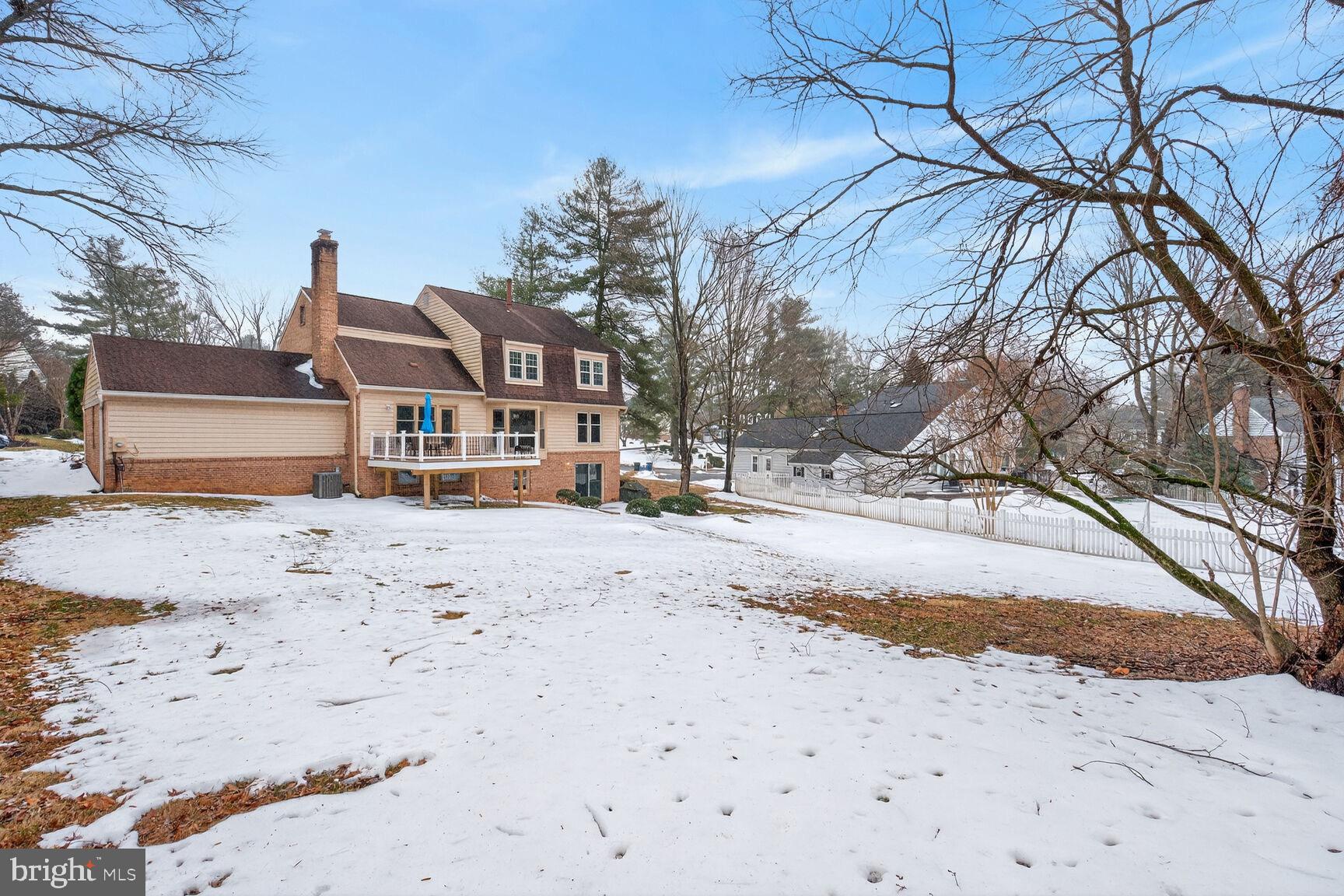 15200 Winstead Lane Silver Spring, MD 20905 - Photo 6 of 53 a view of a road with a house in the background