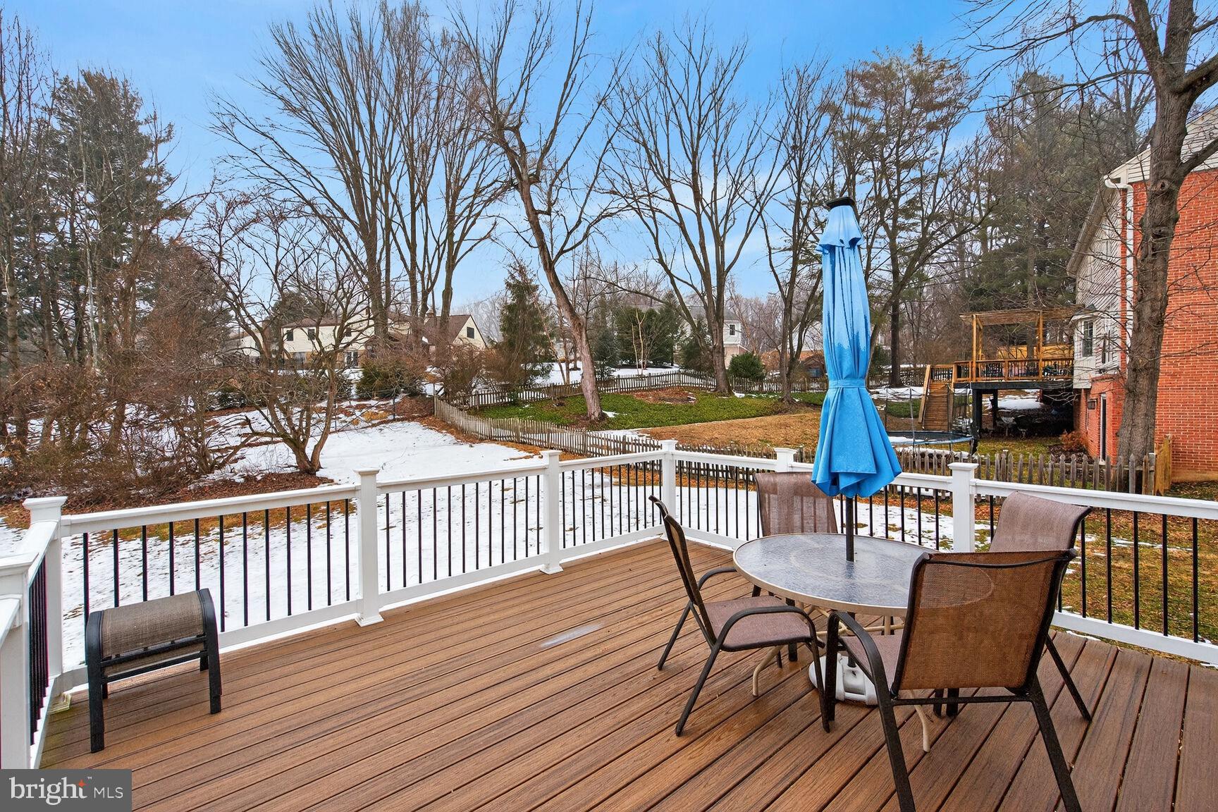15200 Winstead Lane Silver Spring, MD 20905 - Photo 10 of 53 a view of a chairs on a deck