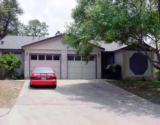 9009 Sanger Drive, Unit B Austin, TX 78745 - Photo 1 of 1 a front view of a house with car parked