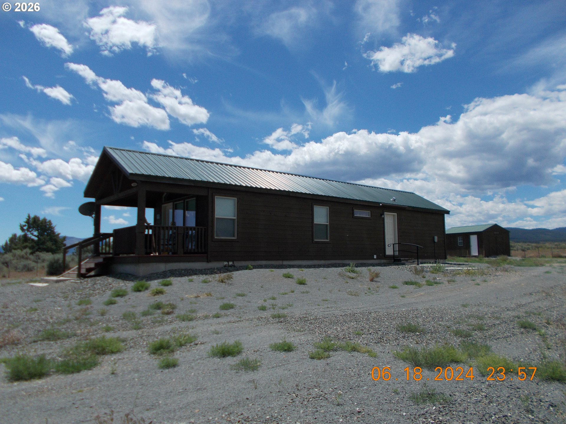 31841 Rice Road Unity, OR 97884 - Photo 26 of 26 a front view of a house with a yard