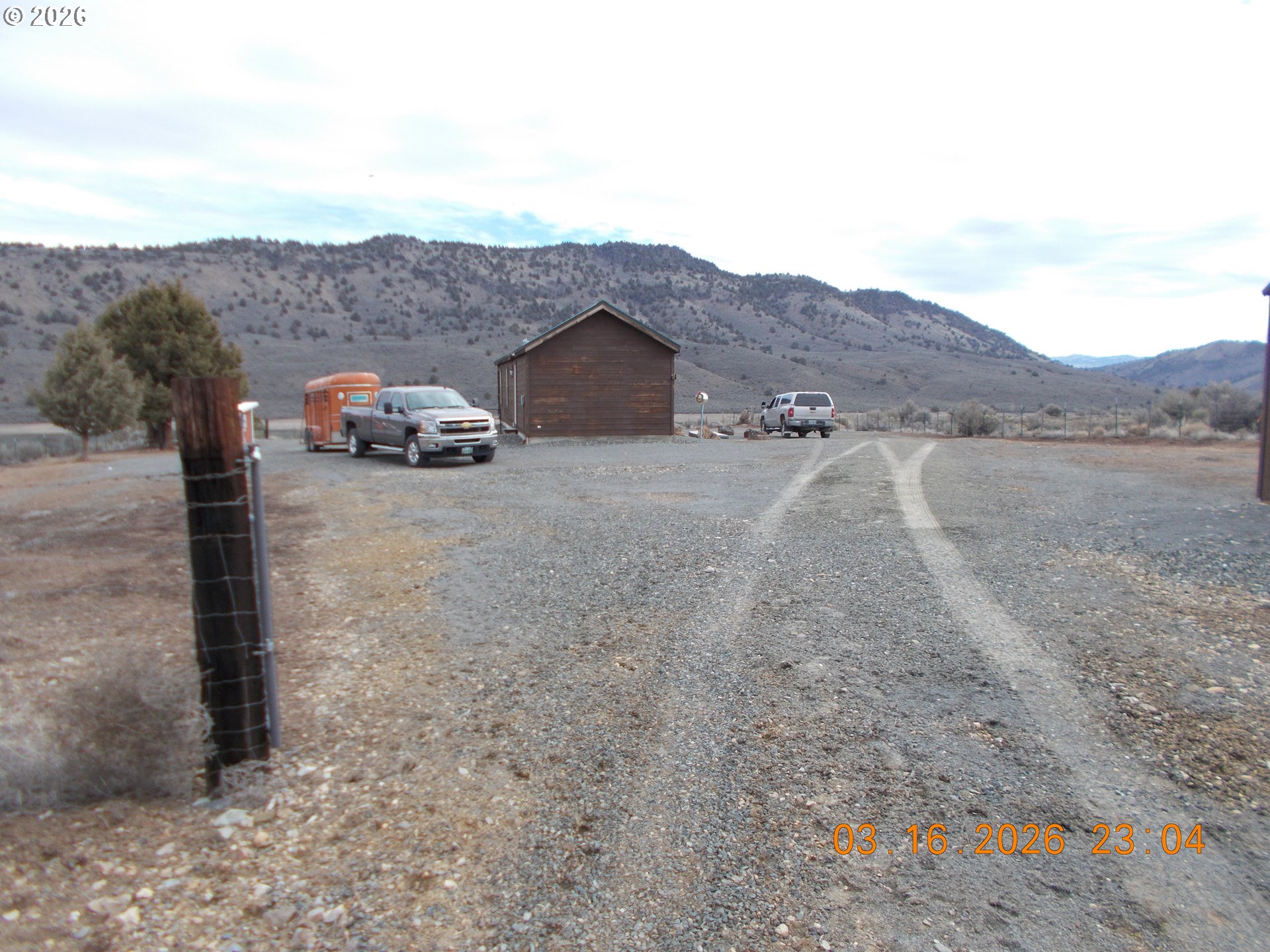 31841 Rice Road Unity, OR 97884 - Photo 6 of 26 a view of a house with a yard and mountain view