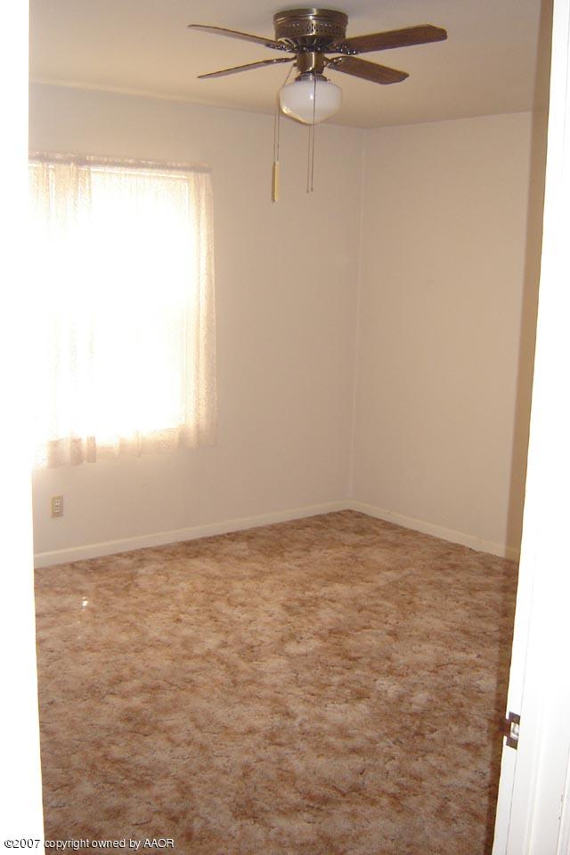 4214 South Lipscomb Street Amarillo, TX 79110 - Photo 4 of 7 a view of empty room with ceiling fan