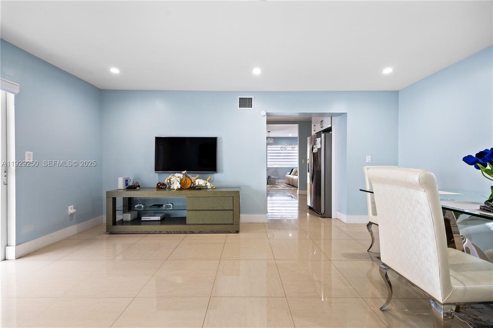 2520 Southwest 13th Street Miami, FL 33145 - Photo 17 of 26 a living room with furniture and a flat screen tv