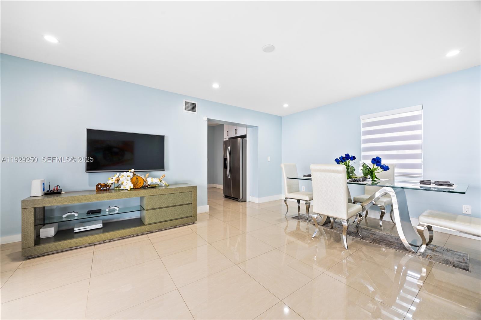 2520 Southwest 13th Street Miami, FL 33145 - Photo 18 of 26 a living room with furniture and a flat screen tv
