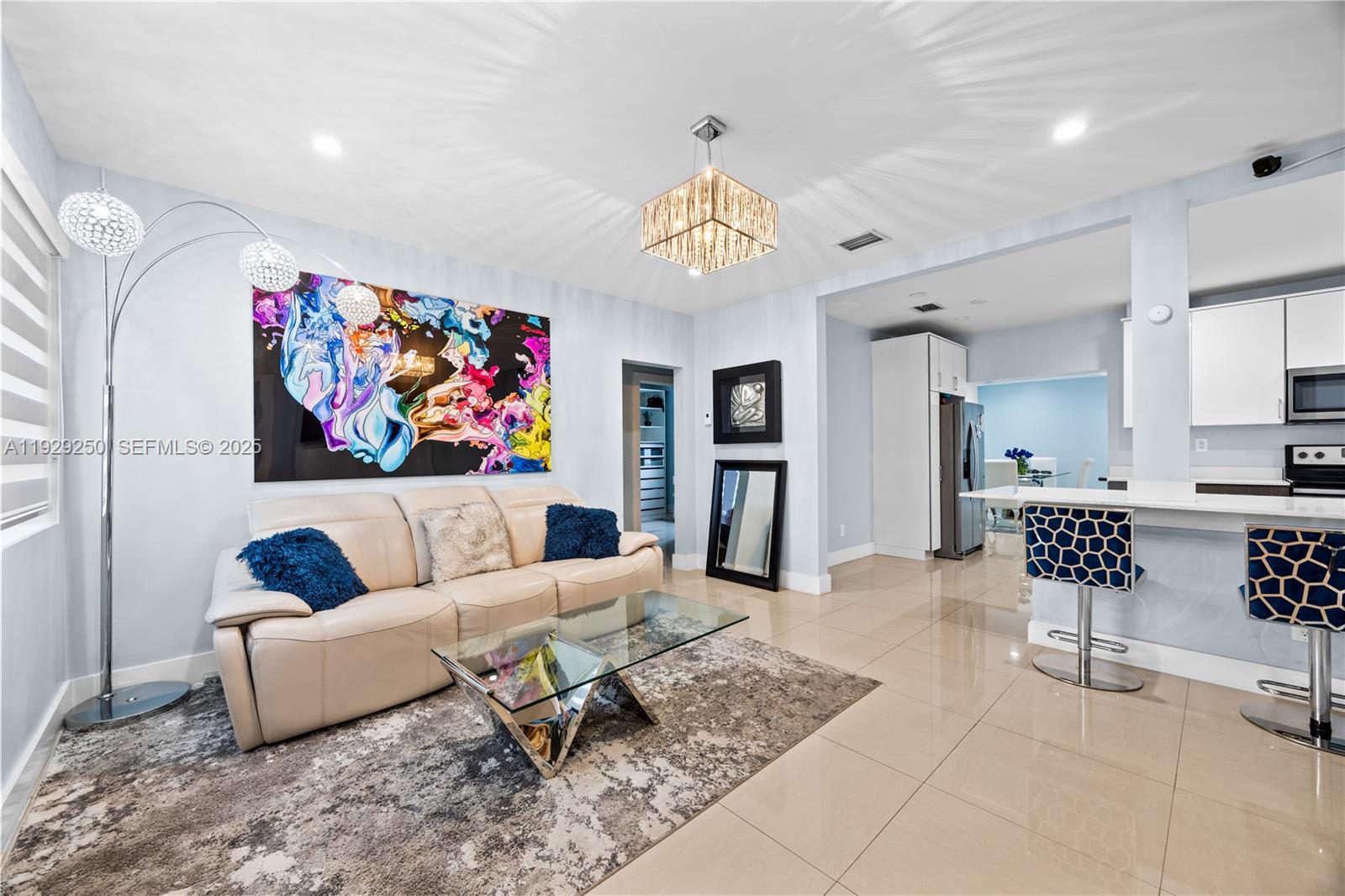 2520 Southwest 13th Street Miami, FL 33145 - Photo 26 of 26 a living room with furniture a refrigerator and a table