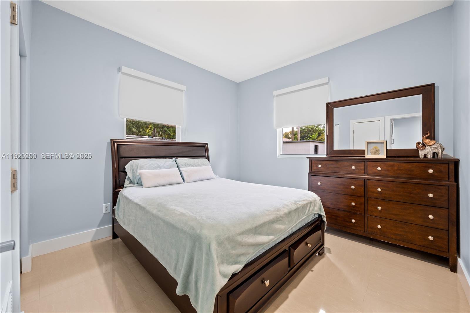 2520 Southwest 13th Street Miami, FL 33145 - Photo 10 of 26 a bedroom with a bed and a dresser