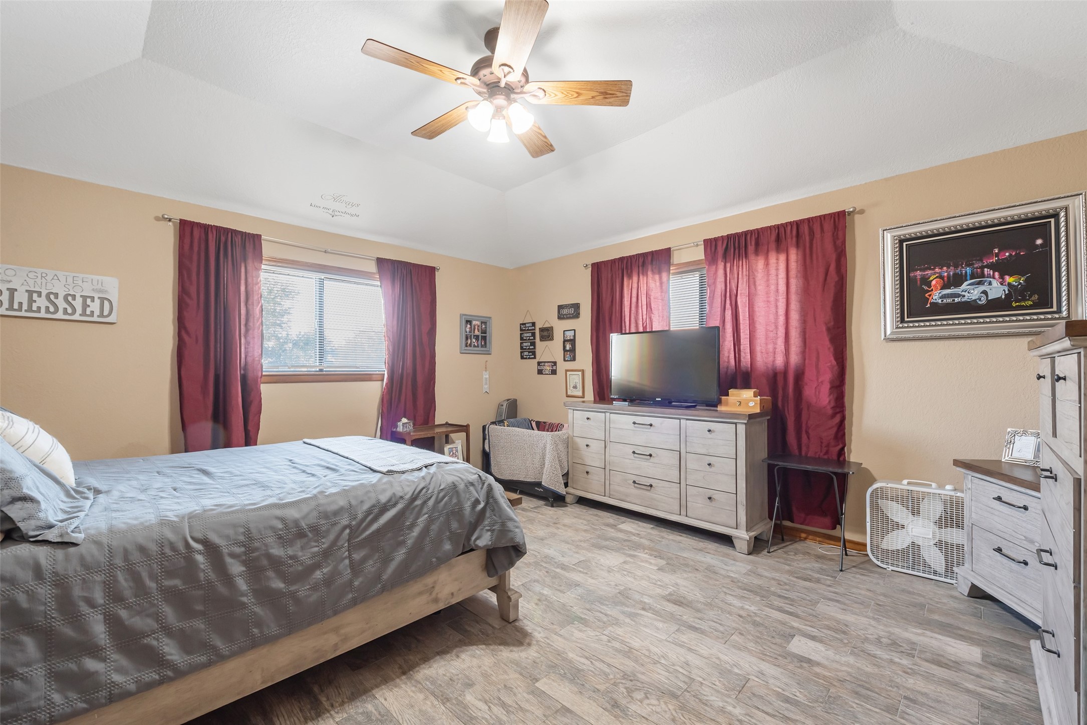 1014 Ginger Street Santa Fe, TX 77517 - Photo 16 of 50 a bedroom with a bed and a flat screen tv