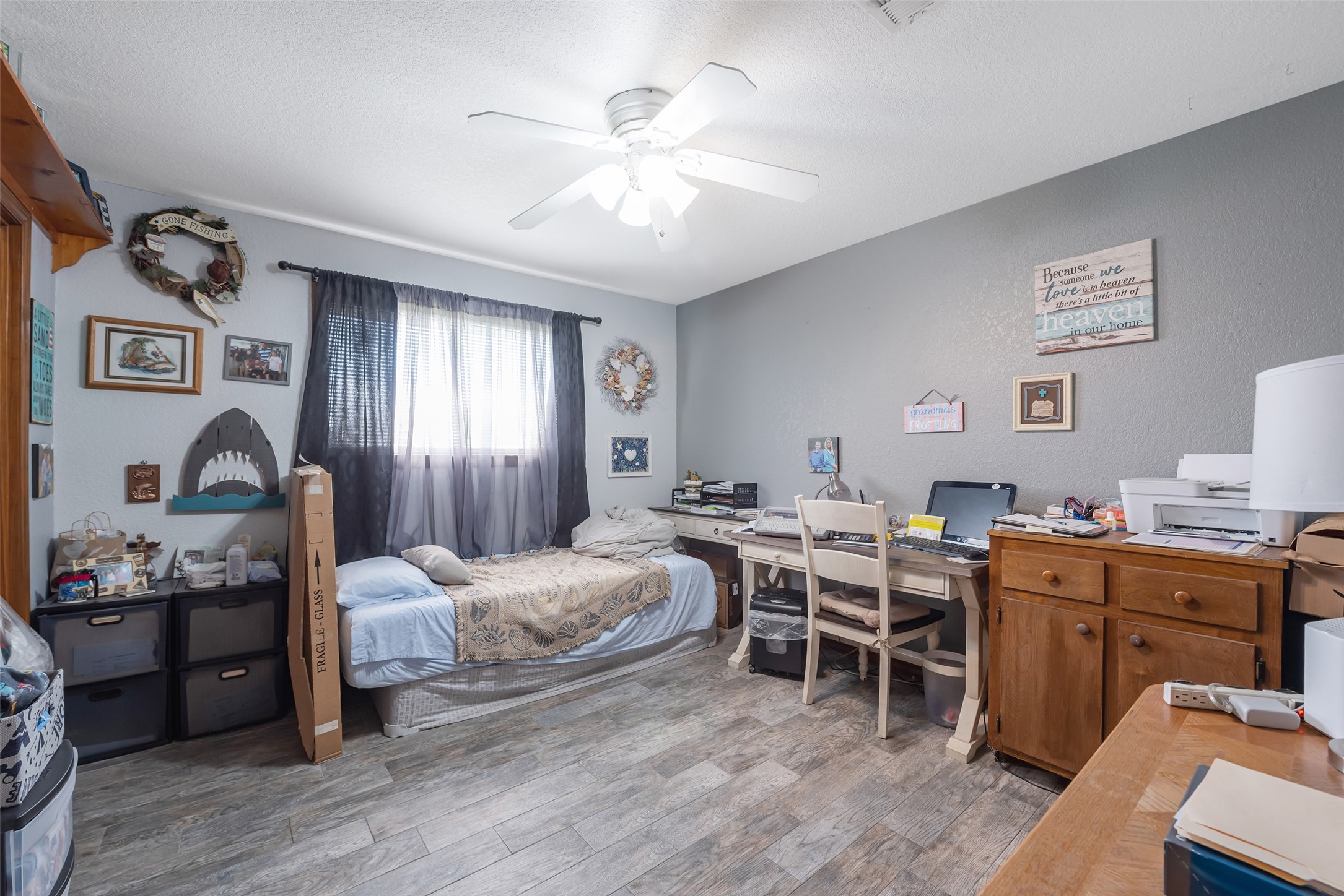 1014 Ginger Street Santa Fe, TX 77517 - Photo 23 of 50 a view of a workspace with furniture and bedroom