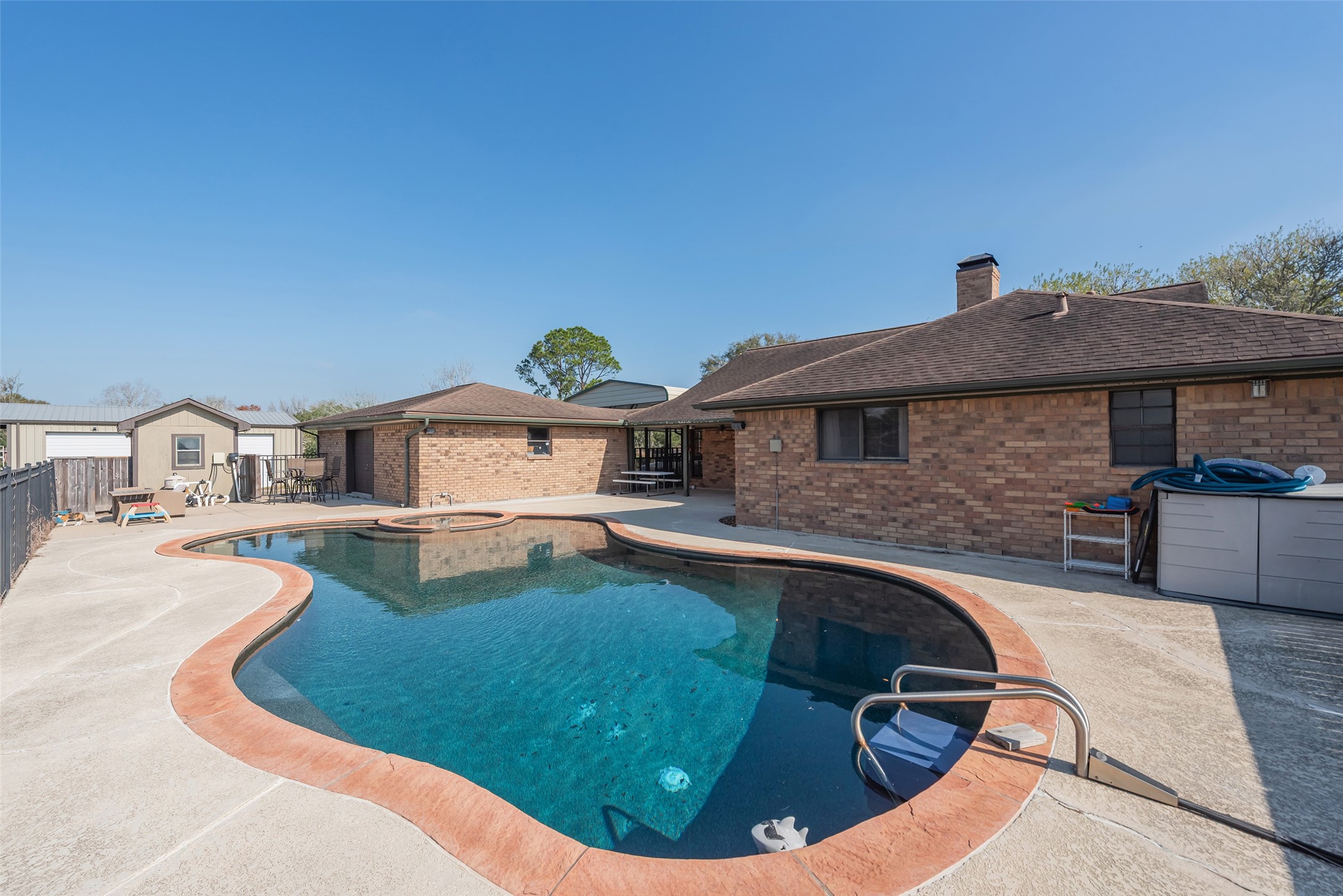 1014 Ginger Street Santa Fe, TX 77517 - Photo 27 of 50 a view of a kitchen with swimming pool