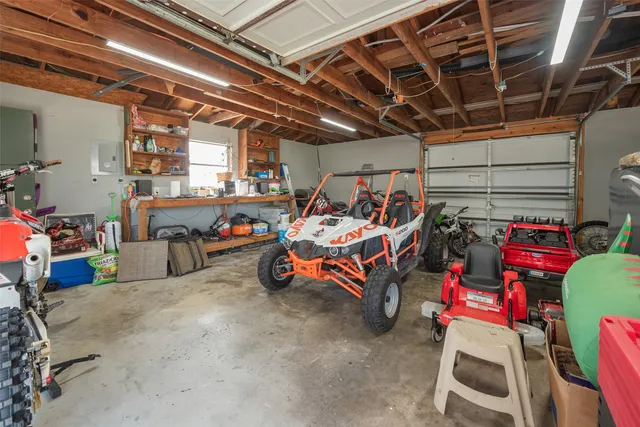 a view of a garage with storage