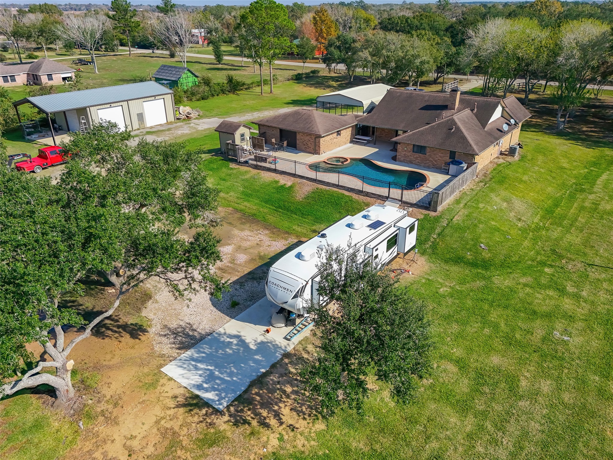 1014 Ginger Street Santa Fe, TX 77517 - Photo 47 of 50 a view of a table and chairs in backyard and yard