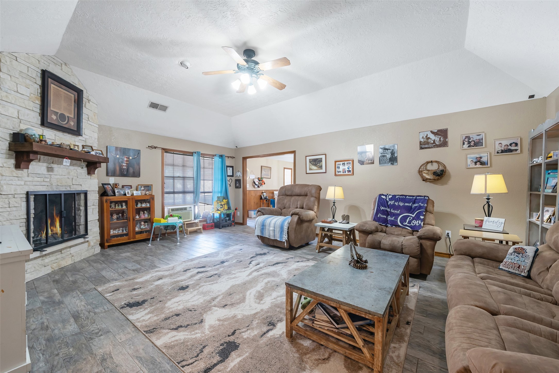 1014 Ginger Street Santa Fe, TX 77517 - Photo 6 of 50 a living room with furniture and a fireplace