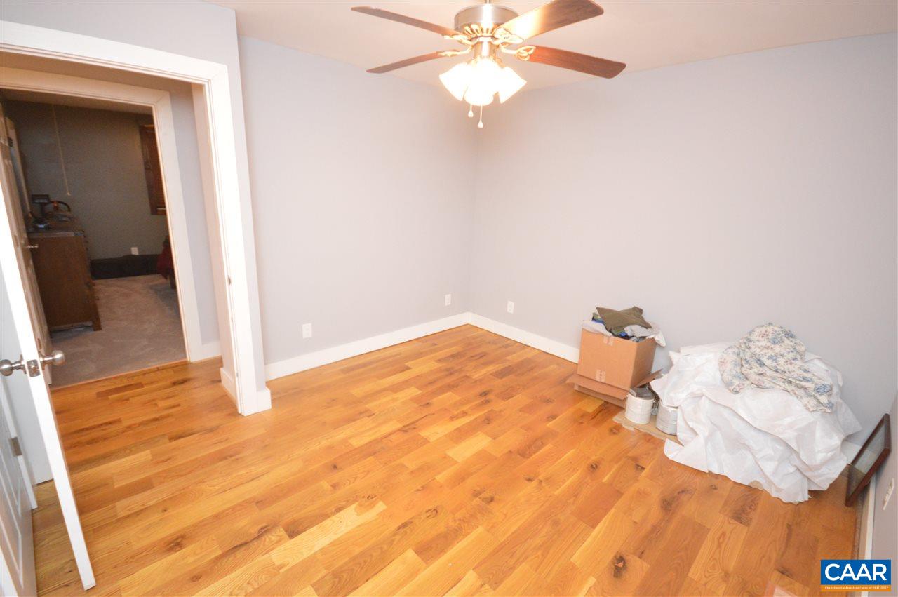 3633 Middle River Road Stanardsville, VA 22973 - Photo 20 of 26 a view of a bedroom with wooden floor
