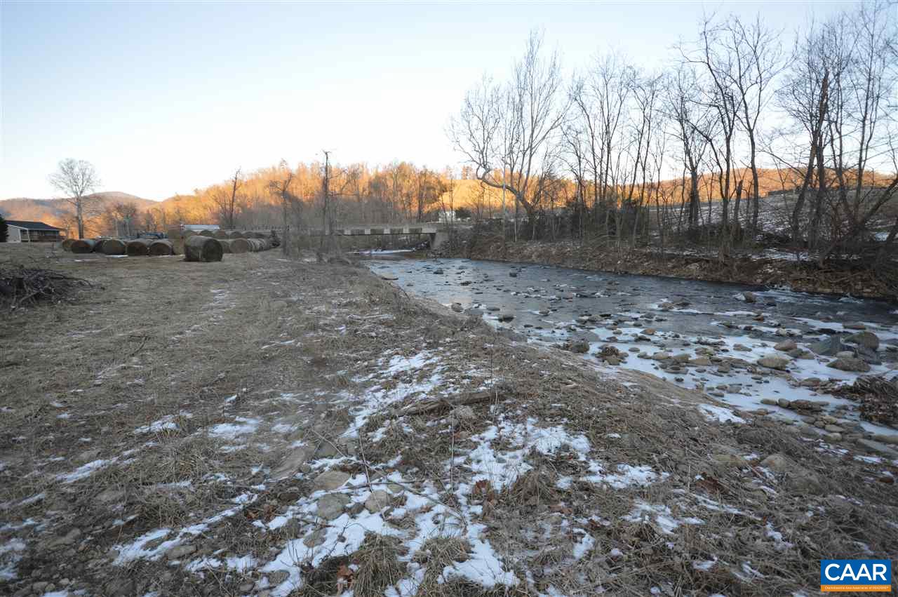 3633 Middle River Road Stanardsville, VA 22973 - Photo 23 of 26 a view of a dry yard with trees and stairs